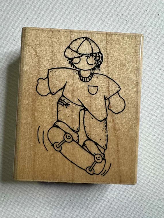 none - 2.5"x3" September- Scottie Skateboarder Wood Mounted Rubber Stamp. Item# CC21 By: JRL Design