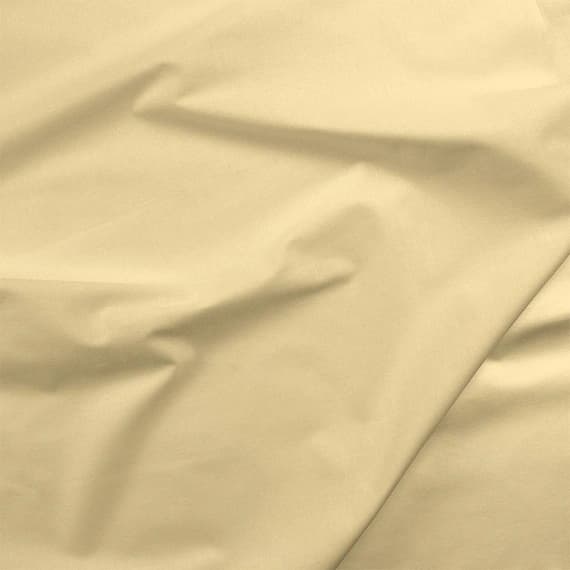 yellow cotton fabric - 100% Cotton Basecloth Broadcloth Solid - Flan Yellow - Paintbrush Studio Fabrics