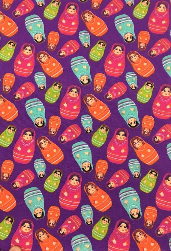 purple cotton fabric - Nesting Dolls on Purple - Poly/Cotton Broadcloth Fabric
